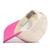 A cream-colored Georgia Pink Out Hat by No Rivals is displayed upside down, revealing an interior label with the brand name and a QR code. This stylish snapback is the perfect way to make a statement and show your support.