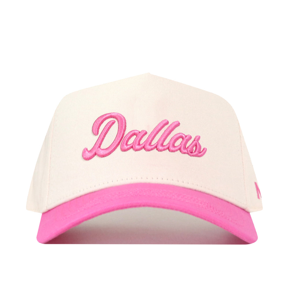 Introducing the No Rivals Dallas Pink Out Hat—a stylish white and pink baseball cap featuring “Dallas” embroidered in pink script on the front, and a convenient snapback closure for the perfect fit.