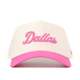 Introducing the No Rivals Dallas Pink Out Hat—a stylish white and pink baseball cap featuring “Dallas” embroidered in pink script on the front, and a convenient snapback closure for the perfect fit.