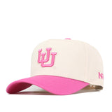 Show your support with the Utah Pink Out Hat by No Rivals—a cream-colored, officially licensed baseball cap featuring a bright pink brim, pink embroidered “UU” on the front and “NR” on the side, plus a convenient snapback closure. This stylish hat is perfect for breast cancer awareness.