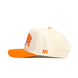 The No Rivals Tennessee Stadium Hat is a white snapback with an orange brim, button, and side "NR" embroidery. Made from high-quality cotton, it has a structured fit and front embroidery that's partially visible from the side.