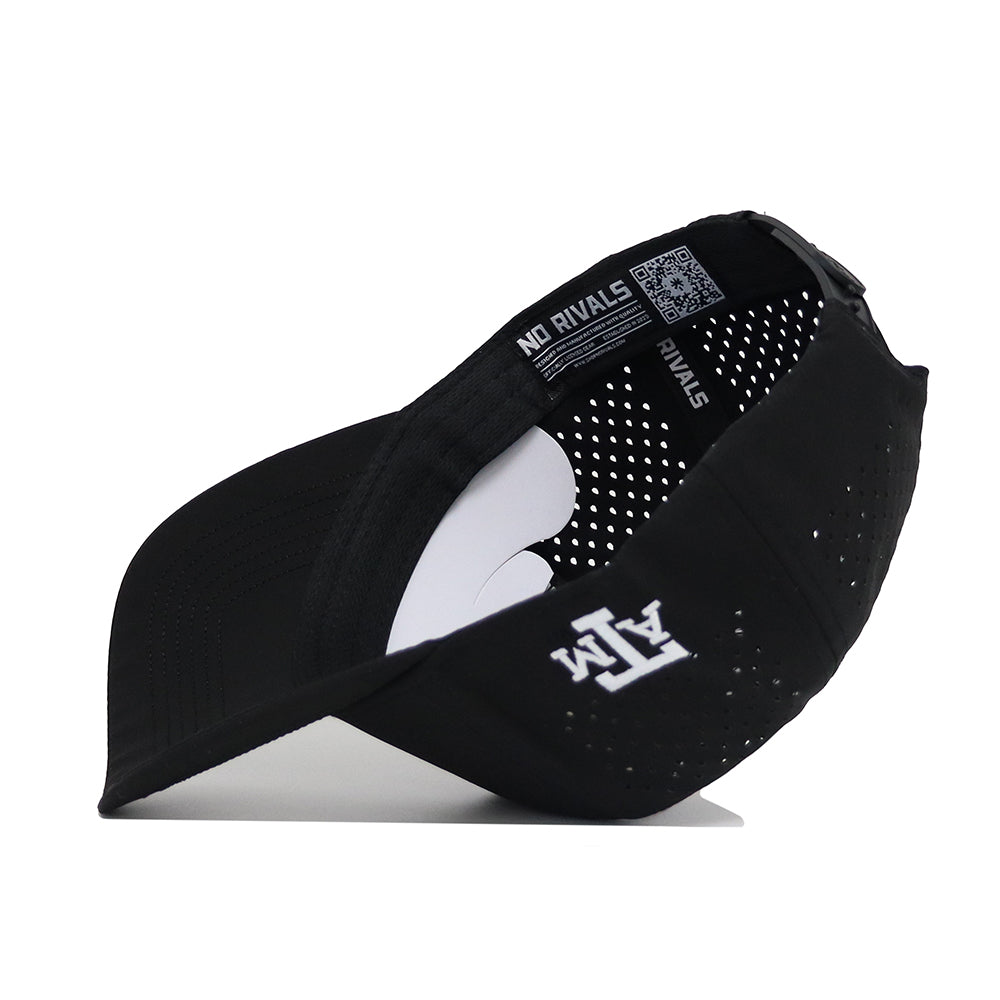 The Texas A&M Ol' Sarge Basketball Hat by No Rivals is a black snapback with a structured fit, perforated sides, and curved brim featuring white “A&M” embroidery. Inside the band: “NO RIVALS” and a QR code. Polyester/cotton blend.