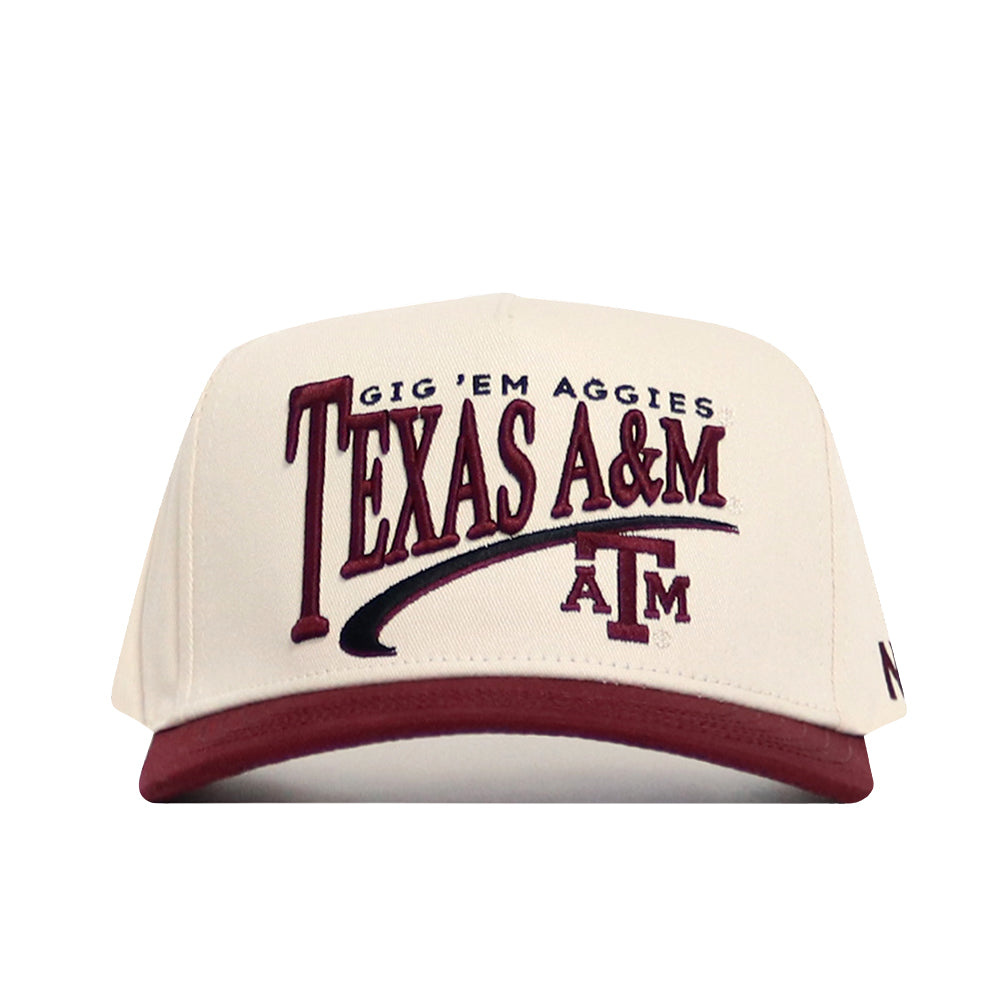 The No Rivals Texas A&M Stride Hat is a cream snapback with a maroon brim, featuring "Gig Em Aggies TEXAS A&M" and the university logo in maroon. Made from high-quality cotton and designed for a structured fit.