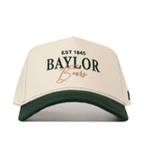 Introducing the No Rivals Baylor Bears Vintage Hat—a stylish white and green snapback featuring “EST 1845 BAYLOR Bears” in bold black and gold lettering on the front. Crafted from high-quality cotton, this hat provides a comfortable, one-size-fits-all fit.
