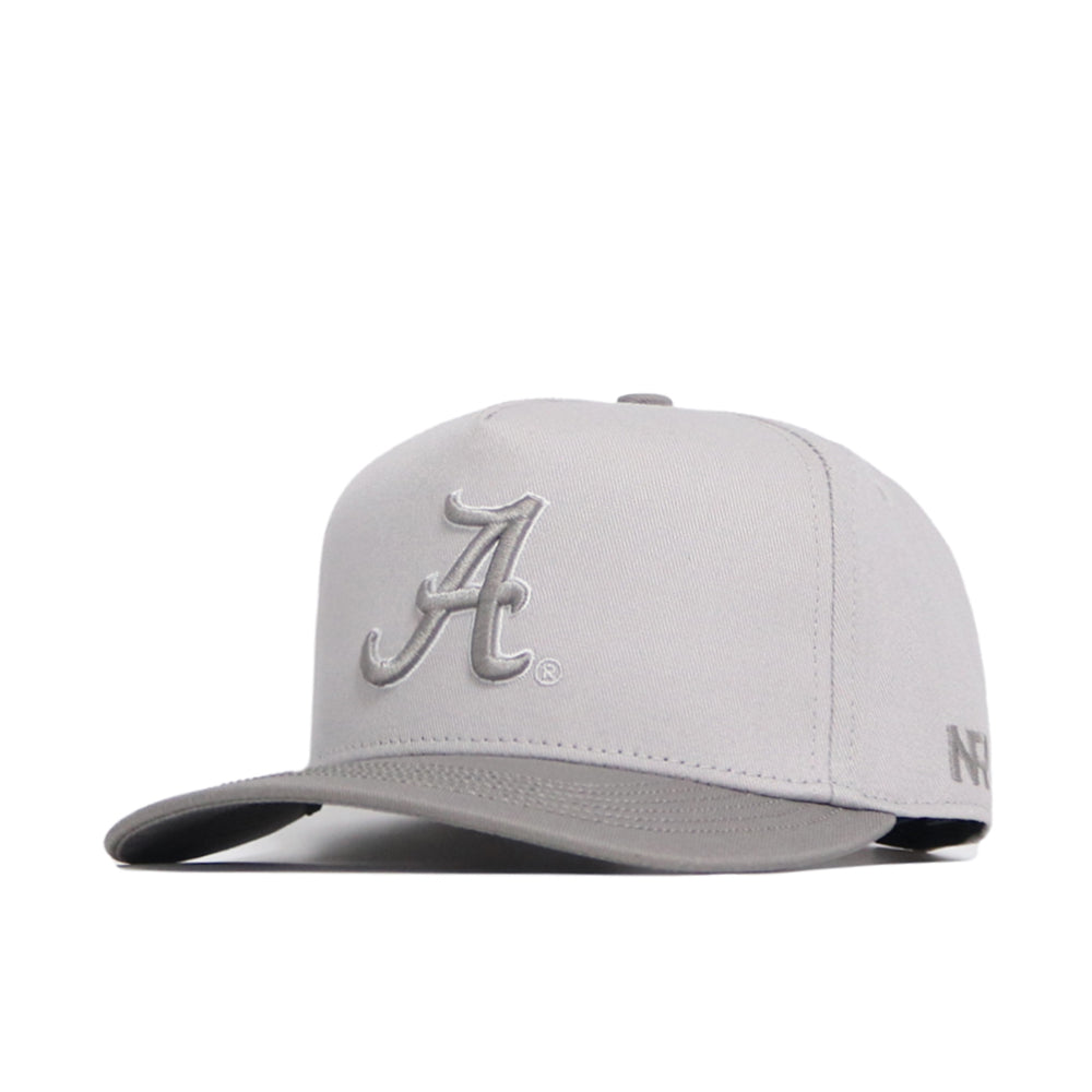 The No Rivals Alabama Graphite Hat is light gray with raised embroidery—a bold 'A' on the front and NFL stitched on the side. Its flat brim and snapback closure give a modern style with an adjustable fit.