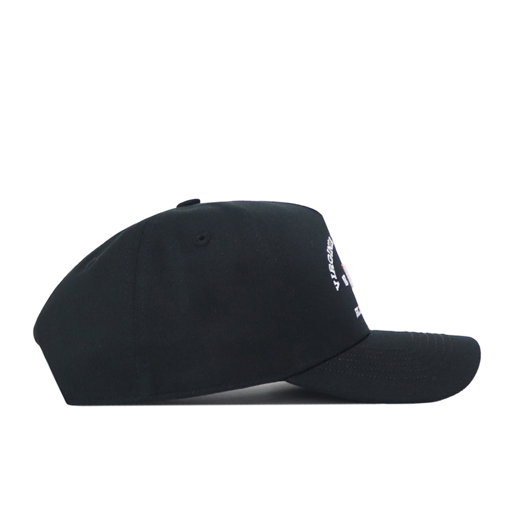 A side view of the Virginia Tech Outlaw Hat by No Rivals is shown against a white background, highlighting its black design with a curved brim and partially visible white text on the front panel. Crafted for the ideal gameday fit, this cap offers customizable comfort with its convenient snap back adjustment.