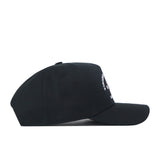 A side view of the Virginia Tech Outlaw Hat by No Rivals is shown against a white background, highlighting its black design with a curved brim and partially visible white text on the front panel. Crafted for the ideal gameday fit, this cap offers customizable comfort with its convenient snap back adjustment.