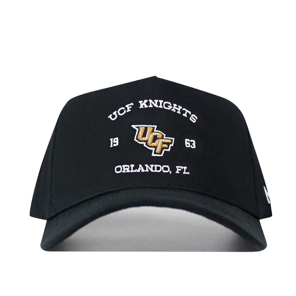 The No Rivals UCF Outlaw Hat in Black showcases a bold, embroidered "UCF Knights," "1963," and "Orlando, FL" logo, along with a gold UCF emblem on the front. Designed with a classic snapback closure, it offers an adjustable gameday fit for any fan.