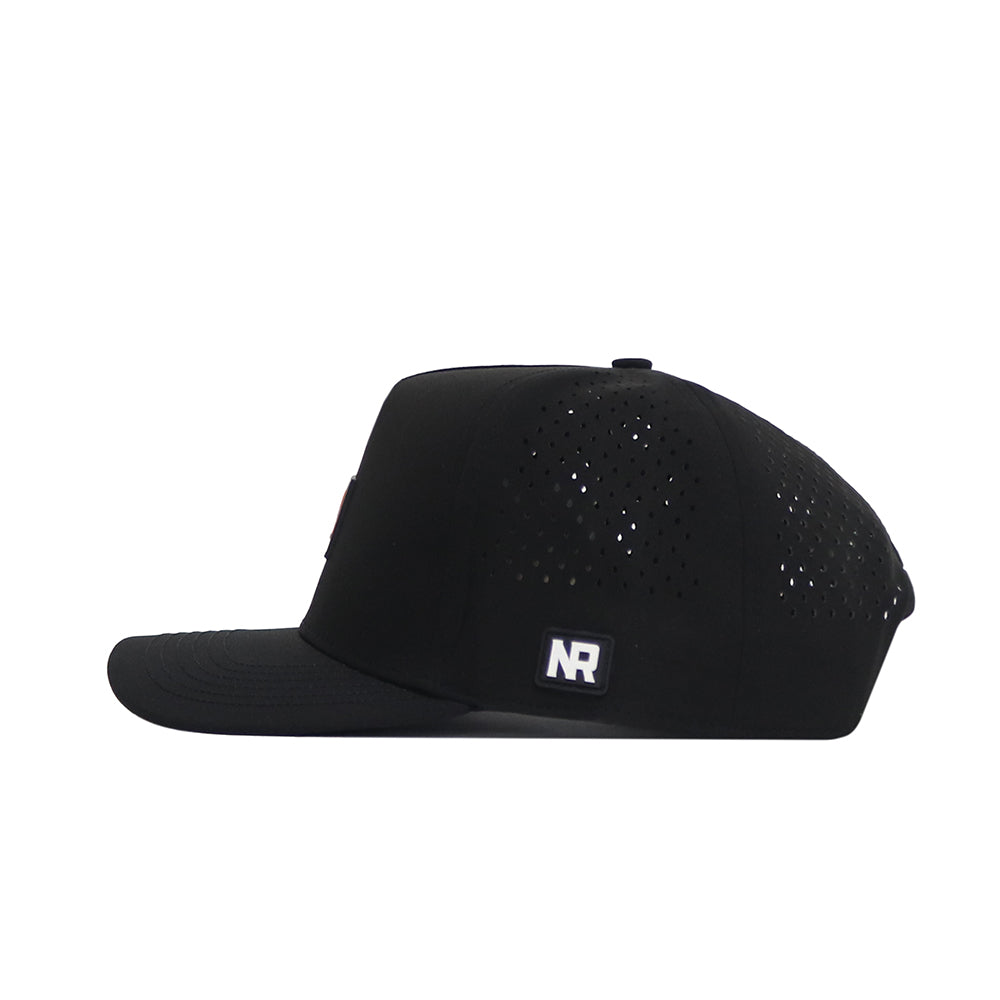 The No Rivals Tennessee Trainer Hat is a black snapback with a flat brim, side view, perforated holes for ventilation, and a small white "NR" PVC patch logo on the side.