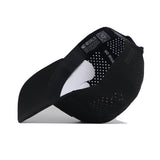 The No Rivals Tennessee Trainer Hat is pictured upside down, revealing its inner lining with ventilation holes, "NO RIVALS" text on the sweatband, performance blend fabric, a curved brim, and an inside tag.