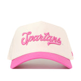 Show your support in style with the Michigan State Pink Out Hat from No Rivals. This officially licensed snapback features a white design with a pink brim and “Spartans” embroidered in pink script on the front—perfect for fans looking to stand out.