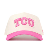 The TCU Pink Out Hat by No Rivals is a white breast cancer hat with TCU in pink, a pink brim, high quality cotton, and snap back adjustment, shown on a white background.