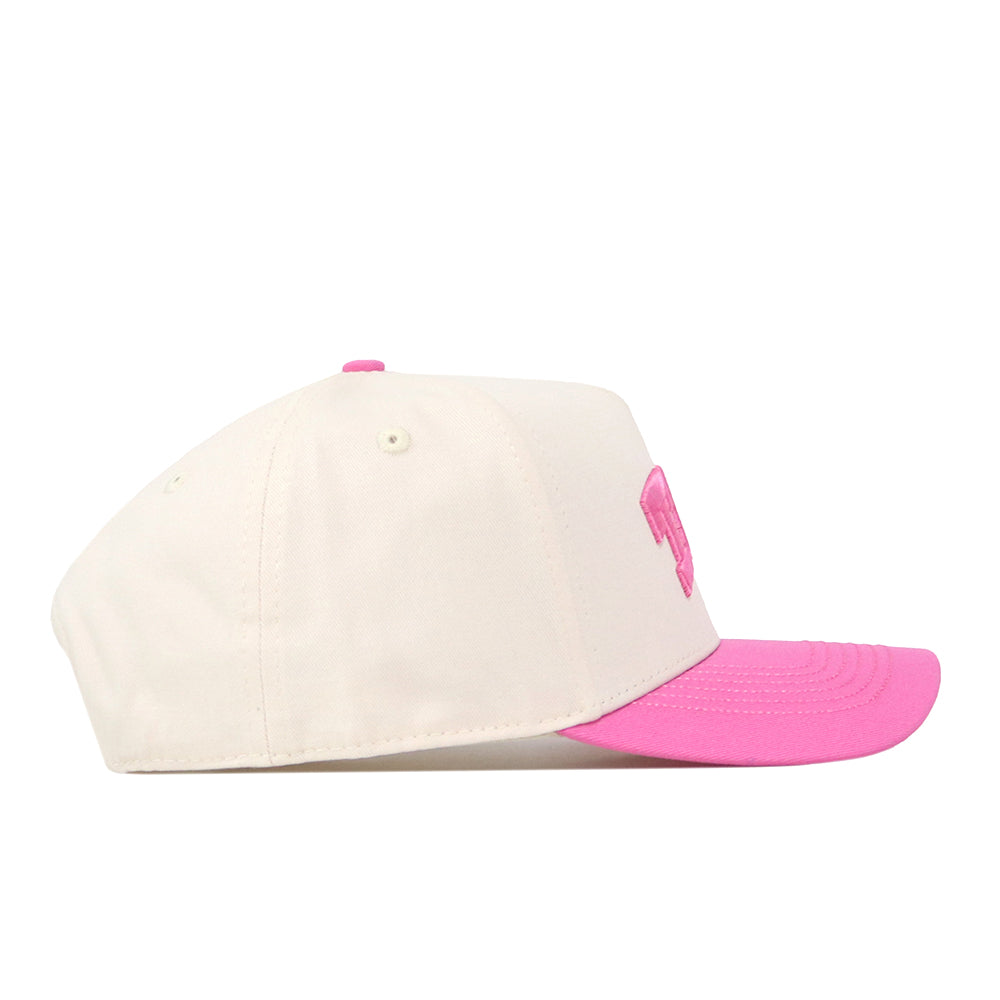 A side view of the No Rivals TCU Pink Out Hat, featuring a white crown, pink brim, pink embroidered front design, adjustable snap back, and high quality cotton against a plain white background.
