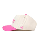 Introducing the No Rivals Virginia Tech Pink Out Hat—a white snapback baseball cap featuring a vibrant pink brim and pink embroidered details, including the letters “NR” on the side. This stylish hat is perfect for raising breast cancer awareness while showing your support.