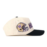 The No Rivals Washington Huskies Alma Mater Hat is a cream baseball cap with a black brim, adorned with embroidered logos including a football helmet featuring a purple W and the word “HUSKIES” in bold purple lettering on the side. This officially licensed snapback hat is perfect for fans who want to showcase their team spirit in style.