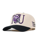 Introducing the TCU Aer Lingus Football Hat by No Rivals—an officially licensed beige and black baseball cap featuring TCU and a purple football helmet embroidered on the front, Texas Christian University embroidered on the side, and an adjustable snap back for a comfortable fit.