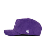 The TCU Vintage Cord Hat is a purple corduroy snapback featuring white NR embroidery on the side, displayed in side profile against a white background.