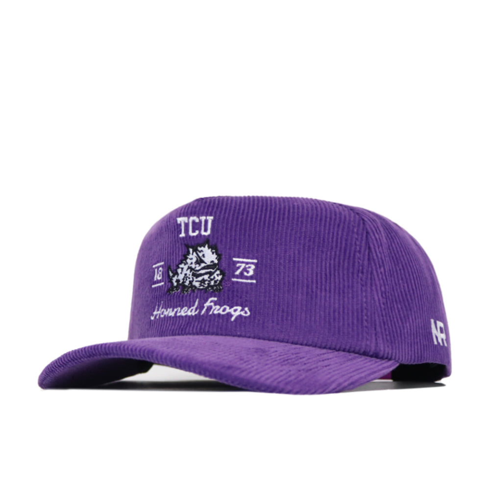 The TCU Vintage Cord Hat is a purple corduroy snapback featuring white embroidery: TCU, horned frog logo, 1873, and Horned Frogs on the front, plus AF on the side. This is an officially licensed product.