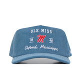 The No Rivals Ole Miss Vintage Cord Hat in powder blue features an unstructured fit with "OLE MISS," "1848," a red "M," and "Oxford, Mississippi" embroidered in white and red on the front.