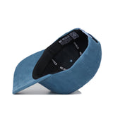 The Ole Miss Vintage Cord Hat - Powder Blue by No Rivals is shown from below, displaying its unstructured fit, black inner band with NO RIVALS text, and an interior QR code label.