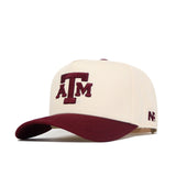 The No Rivals Texas A&M Logo Patch Hat is cream with a maroon brim, 3D embroidered maroon ATM logo on the front, an official license, and a small NP logo on the side.