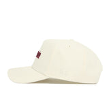 The No Rivals Mississippi State Sideline Hat is a cream baseball cap with a structured fit, maroon embroidered letters on the front, and white NR initials stitched on the side, shown in side view against a white background.