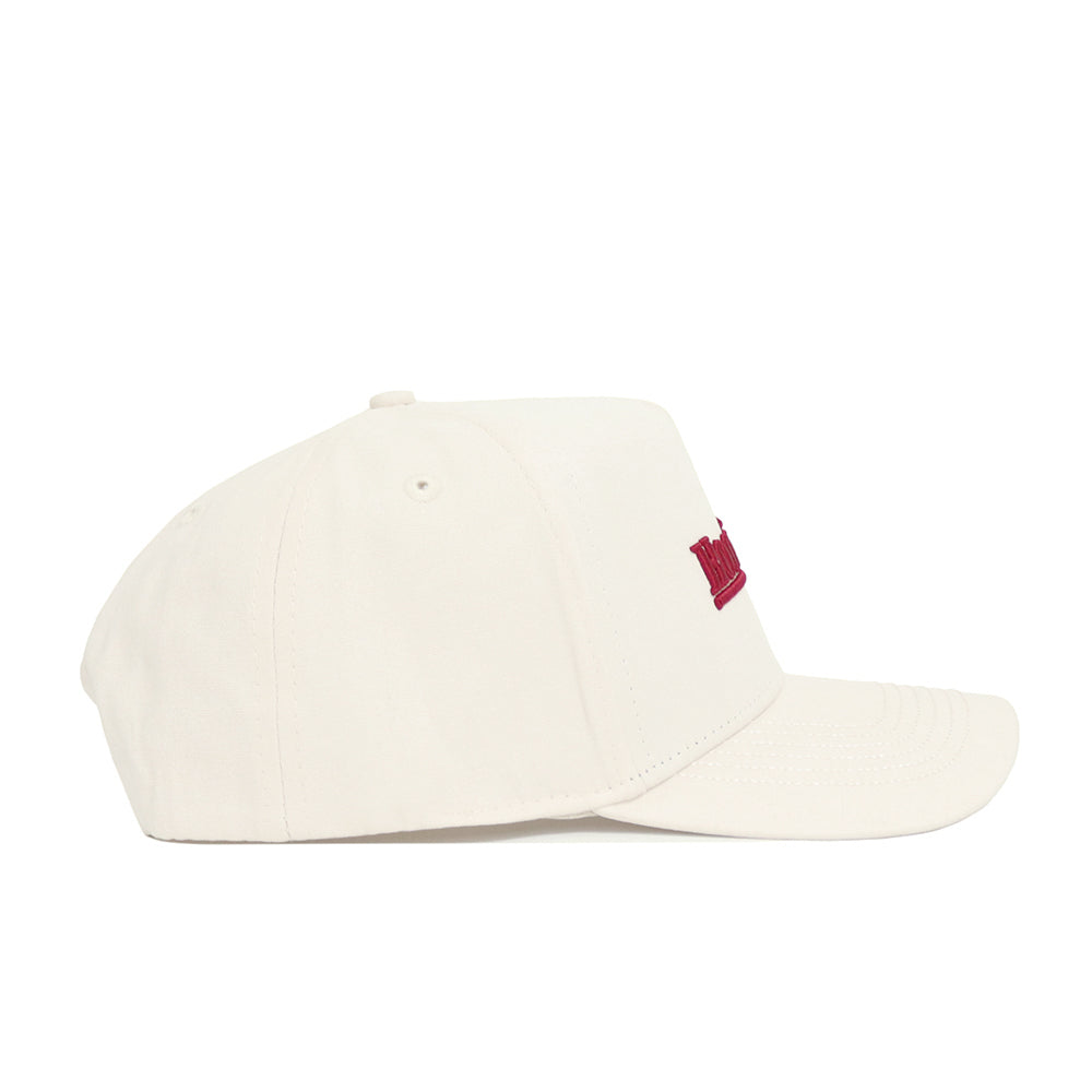 The Indiana Sideline Hat by No Rivals is a white snapback with a curved brim, structured fit, and a small red embroidered front design, crafted from high-quality cotton and shown in side view.