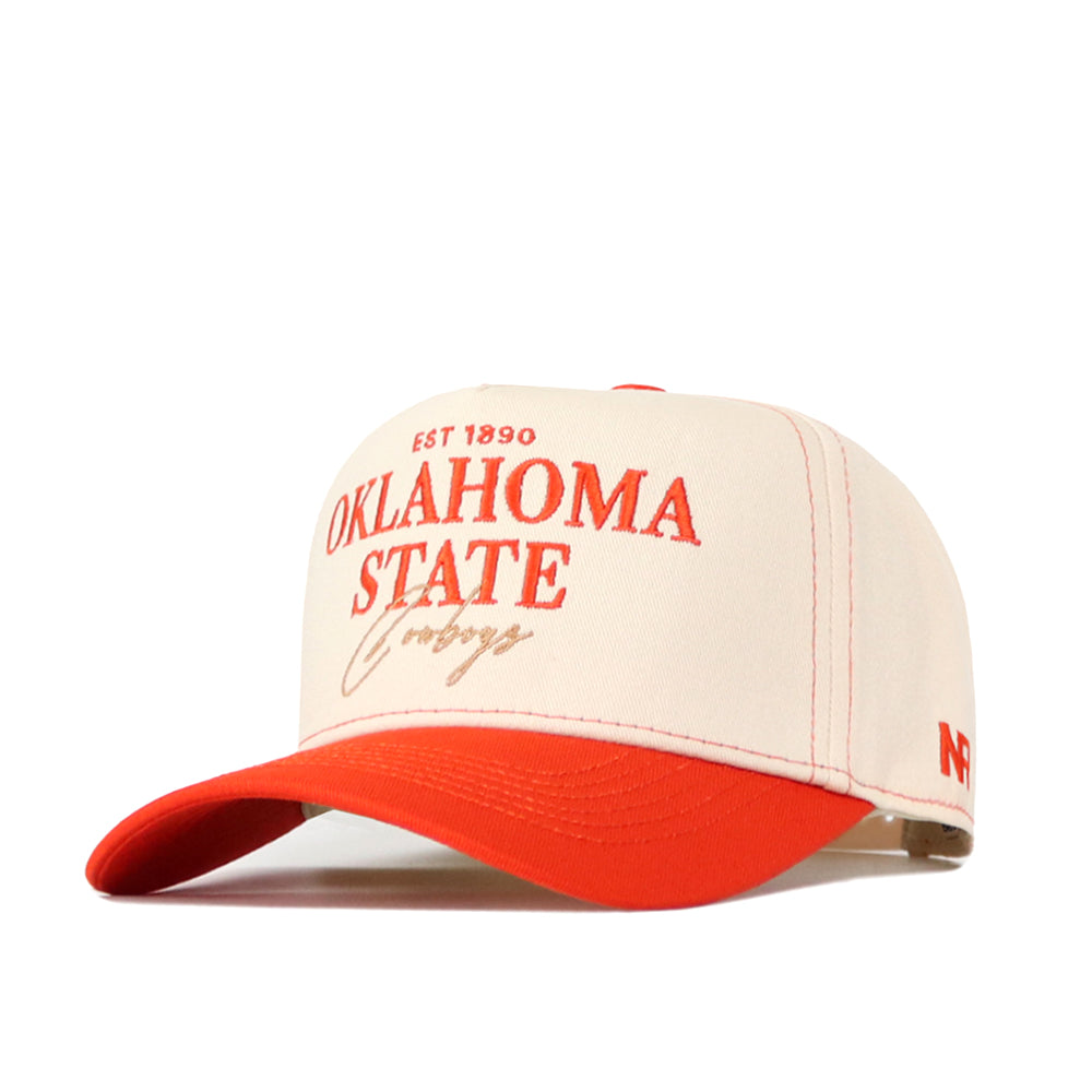 Show your Oklahoma State spirit with the No Rivals Oklahoma State Cowboys Vintage Hat. This cream and orange team cap features “Oklahoma State Cowboys EST 1890” on the front, detailed red stitching accents, a bold red brim, and a classic snapback closure—making it the perfect finishing touch to your gameday outfit.