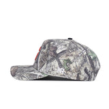 A side view of the No Rivals Syracuse Outland Hat shows its camouflage snapback design with a flat brim, red embroidered letters on the front, and a small white NR logo by the brim. Made from high quality cotton for comfort and durability.