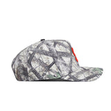 The No Rivals Syracuse Outland Hat, a high-quality cotton snapback with a gray, black, and green camouflage pattern and flat brim, is displayed in side profile against a white background.