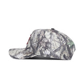 Side view of the No Rivals USC Outland Hat, a structured fit snapback with a flat brim and camouflage pattern in brown, green, and gray cotton. Features a white NR logo on the side.