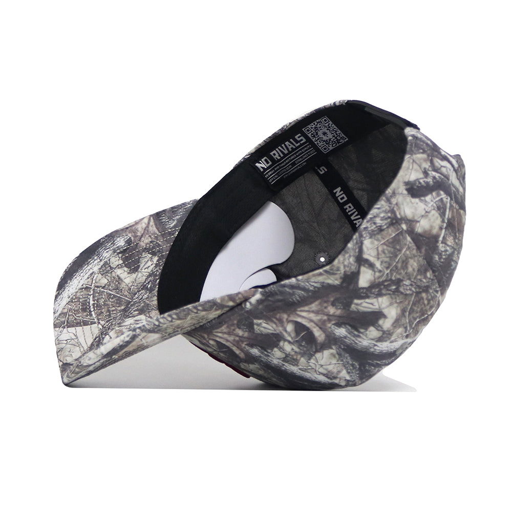 The USC Outland Hat by No Rivals, shown upside down, displays its black interior with "NO RIVALS" printed along the inner edge for a bold accent.