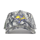 The No Rivals South Dakota State Outland Hat is a camouflage snapback featuring a yellow and blue jackrabbit logo embroidered on the front, made from high-quality cotton for a comfortable, structured fit.