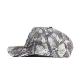 Side view of the No Rivals South Dakota State Outland Hat, a structured fit snapback with a flat brim, camouflage pattern in brown, gray, and green, and a stitched white NR logo on the side.