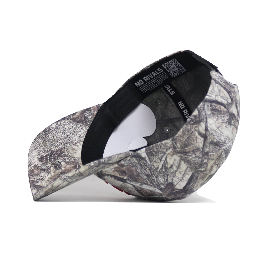 The Fresno State Outland Hat by No Rivals is shown upside down, revealing its interior and NO RIVALS text on the inner band. This structured-fit, camouflage snapback cap is made from high-quality cotton for comfort and durability.