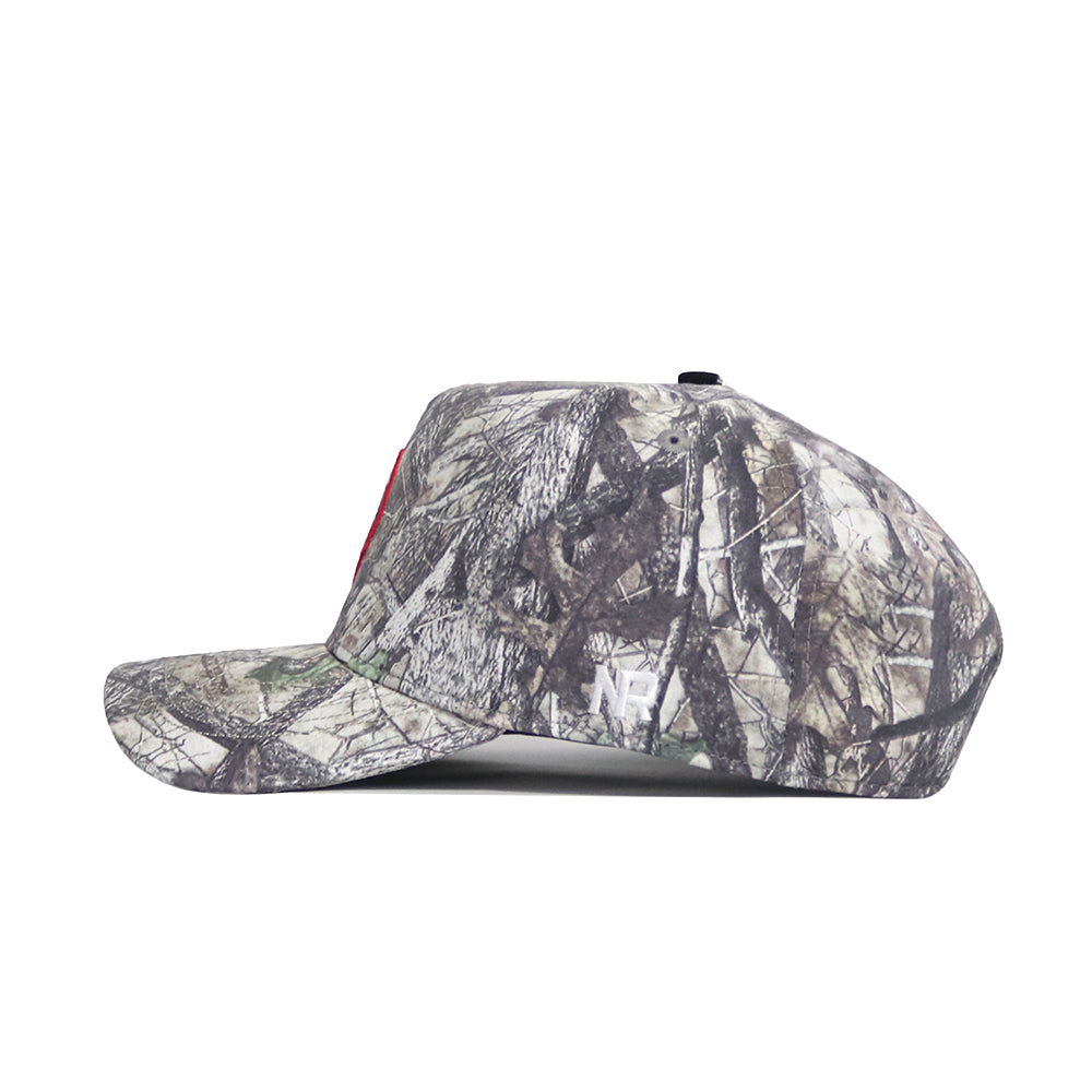 The No Rivals UConn Outland Hat is a high-quality cotton baseball cap with a structured fit, flat brim, and camouflage pattern in green, brown, and gray tones—perfect for outdoor style and lasting comfort.