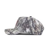 The No Rivals UConn Outland Hat is a high-quality cotton baseball cap with a structured fit, flat brim, and camouflage pattern in green, brown, and gray tones—perfect for outdoor style and lasting comfort.