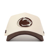 The No Rivals Penn State Espresso Hat is a beige and brown baseball cap featuring an embroidered outline of a lion’s head logo on the front. Made from high-quality cotton, this structured snapback hat has a brown brim and showcases the logo stitched in brown and white. The cap is displayed against a white background.