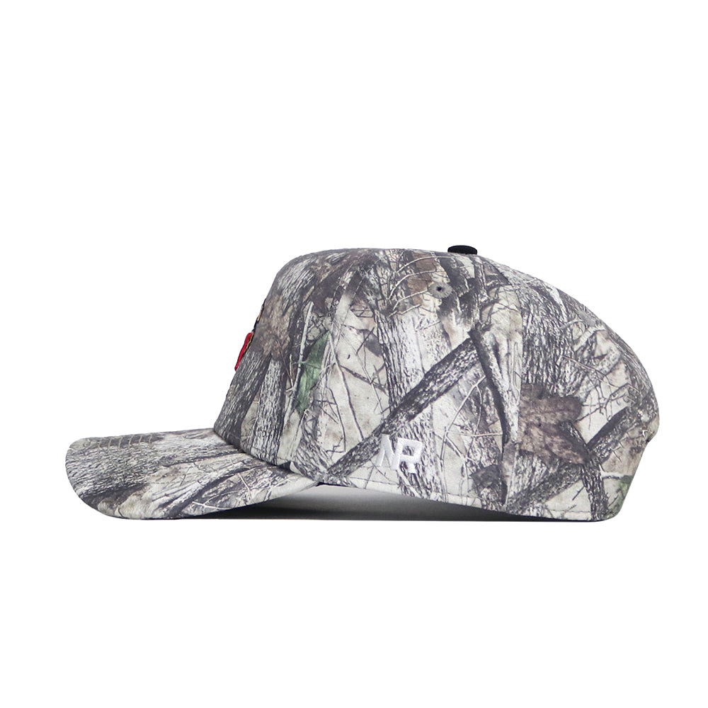 Side view of the No Rivals Maryland Outland Hat, an officially licensed snapback with a brown, green, and beige camouflage pattern. Made from quality cotton, it has a flat brim and features an embroidered logo on the front.