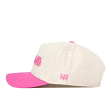 Introducing the No Rivals UNC Charlotte Pink Out Hat—a cream-colored snapback baseball cap featuring a vibrant pink brim, matching pink top button, and eye-catching pink embroidery details. Embellished with embroidered logos like the NR initials on the side, this hat is the perfect finishing touch to complete your gameday fit.