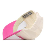 The UNC Charlotte Pink Out Hat by No Rivals is displayed upside down, revealing the interior tags and stitching details. Featuring a pink brim and a cream-colored body, this snapback hat is the ideal finishing touch for your gameday outfit, blending comfort with classic style.