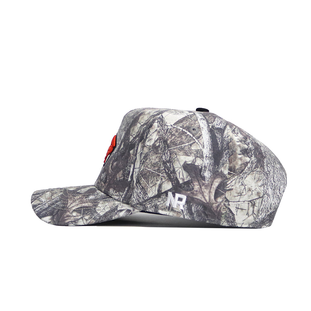 Side view of the Oregon State Outland Hat by No Rivals, a snapback with gray and brown camo, red embroidered front logo, white NR initials on the side, and made from high quality cotton for comfort and durability.