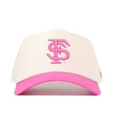 A white baseball cap with a vibrant pink curved brim, the No Rivals Florida State Pink Out Hat features a pink embroidered interlocking logo on the front. This officially licensed breast cancer awareness hat also includes a convenient snapback adjustment for the perfect fit.