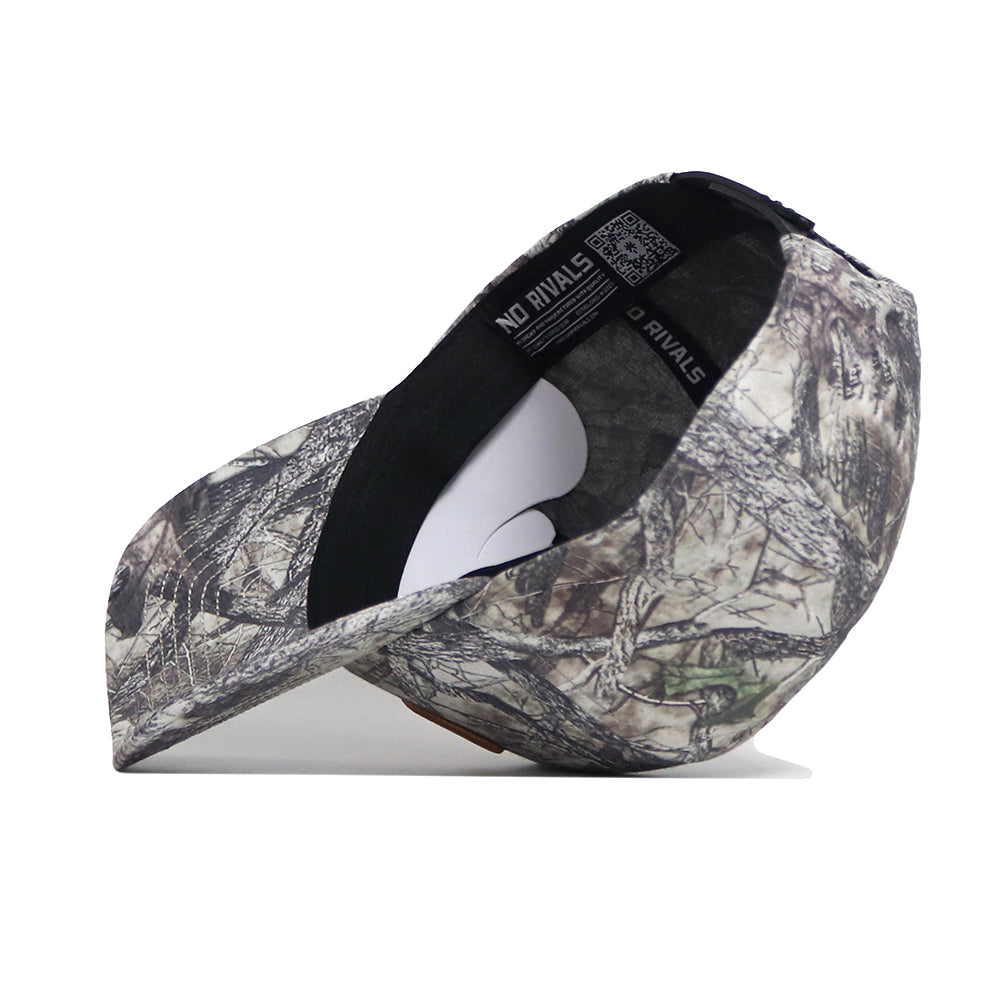 The Georgia Tech Outland Hat by No Rivals is shown upside down, revealing its black interior band boldly printed with "NO RIVALS" inside for a striking detail.