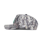 The No Rivals North Texas Outland Hat features a gray camo pattern, flat brim, snapback closure, and structured fit. "NR" is embroidered in white on high-quality cotton for comfort and durability. Shown from the side.