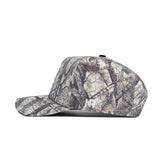 A side view of the No Rivals Creighton Outland Hat, a structured fit cap with a flat brim and woodland camo pattern. "NF" is embroidered in white near the back, crafted from high-quality cotton for comfort and durability.
