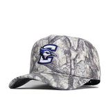 The No Rivals Creighton Outland Hat is a structured fit camouflage cap made from high quality cotton, featuring an embroidered blue and white C and bluejay logo on the front, with a curved brim and adjustable back strap.