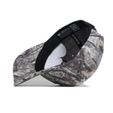 The Utah Outland Hat by No Rivals features a camouflage design and snapback closure, shown on its side to reveal the inner band printed with "NO RIVALS." Made from high quality cotton for comfort and durability.