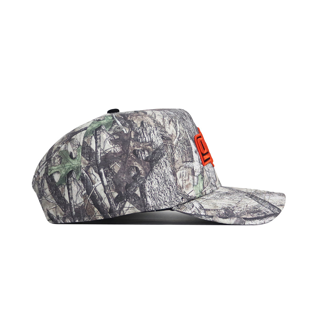 The No Rivals Oklahoma State Outland Hat features a camouflage cotton design with a structured fit, flat brim, and orange embroidery on the front. Shown in side profile, this snapback cap is set against a white background.