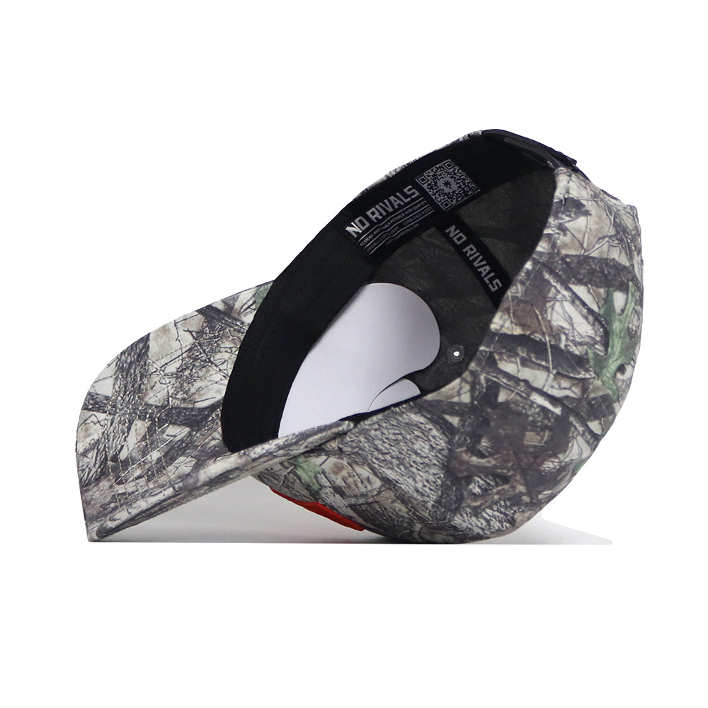 The Oklahoma State Outland Hat by No Rivals features a camouflage cotton design, curved brim, structured fit, and adjustable snapback. Shown on its side, the black interior band displays NO RIVALS branding.